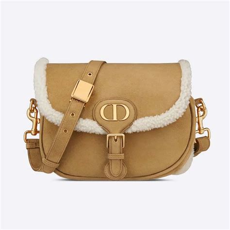 dior camel shearling bag.